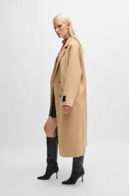 Abrigo largo oversize fit con cierre cruzado