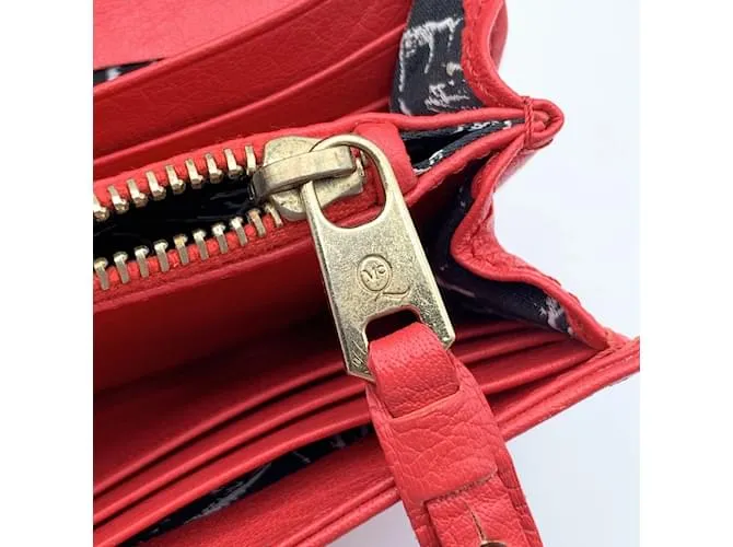 Mcq Alexander ueen Cartera continental con tachuelas de cuero rojo Roja 