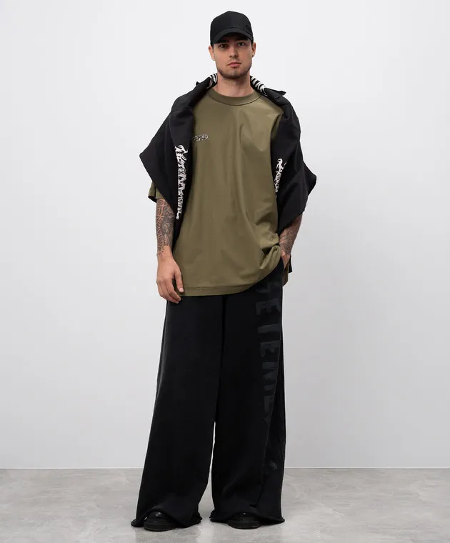 Vetements Black sweatpants with a vintage effect