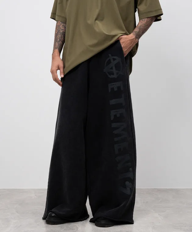 Vetements Black sweatpants with a vintage effect