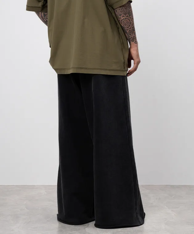 Vetements Black sweatpants with a vintage effect