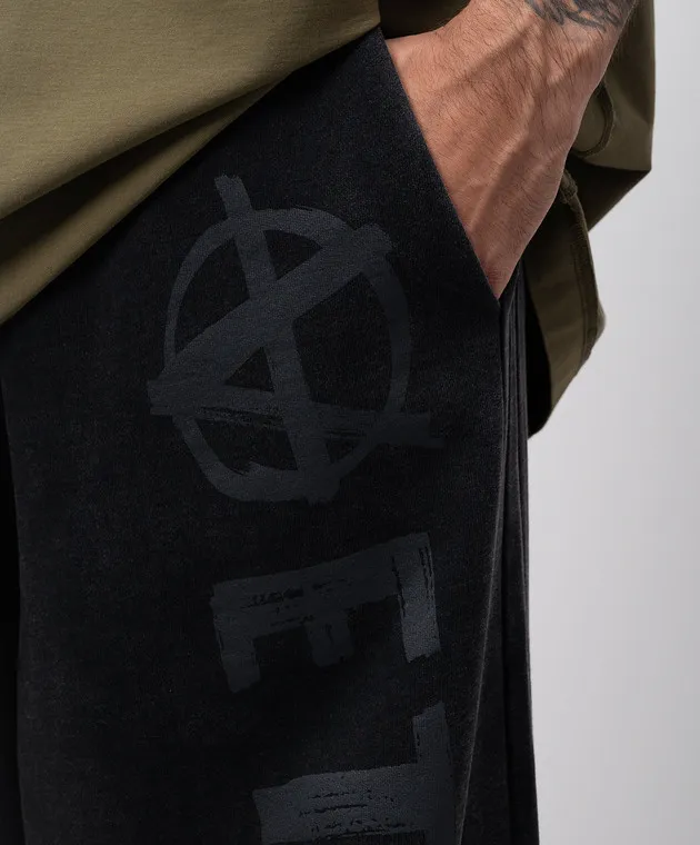 Vetements Black sweatpants with a vintage effect